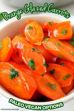 a white bowl filled with sliced carrots on top of a table