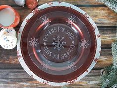 a glass plate with the words christmas written on it