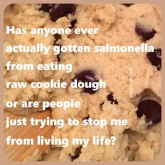 a close up of a cookie on a wooden surface with words above it that read, has anyone ever actually gotten salmonella from eating raw cookie dough or are people just trying to stop