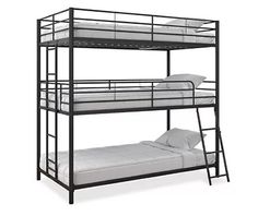 a bunk bed with two sets of mattresses on top and bottom bunk beds below