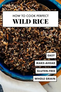 a bowl filled with wild rice on top of a table