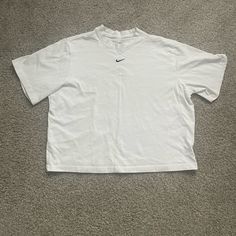 Never Worn White Nike T Shirt! Nike Relaxed Fit Top For Summer, Nike Short Sleeve Shirt For Summer, Nike Basic Tops For Spring, Nike Basic Relaxed Fit Tops, Nike Basic Tops With Relaxed Fit, Nike White Tops For Summer, Nike Cotton Tops Relaxed Fit, White Nike Tops For Spring, Basic White Nike Top