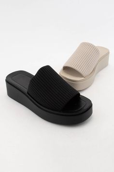 Indulge in luxury with these platform slide sandals. Designed with a stretch fabric upper strap and slip-on style, these sandals provide both comfort and style. The open-toe design and matching color footbed and platform add a touch of elegance. Elevate your look with a 2 inch heel and 1.75 inch platform height. Fit & Details: True to size Platform Slide Sandals, Holiday Sparkle, Platform Slides, 2 Inch Heels, Elevate Your Look, Toe Designs, Fall Collections, Inspirational Women, Shoe Sale