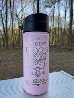 Disney's Encanto Inspired Tumbler/ Water Bottle.  Sizes: 18oz.   Colors: pink, navy, black.  If you want a specific size or color, let me know and I'll find it for you!  Any size, any color!  Possibilities are ENDLESS! Pick a design shown or tell me and I'll create it.  I will beat anyone's price to get your business.  Thank you for looking! Engraved Tumbler, Navy Purple, Business Thank You, Bottle Sizes, Insulated Water Bottle, Design Show, Purple Black, Custom Engraving, Tell Me