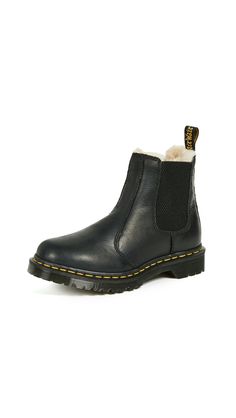 PRICES MAY VARY. Constructed for comfort on the iconic Dr. Martens air-cushioned sole This boot is Goodyear-welted, meaning the upper and sole are sewn together in our heat-sealed z-welt stitch. Good abrasion and slip resistance Lined with warm faux fur Retains essential Doc DNA, like yellow stitching, grooved sides, and heel loop Wipe away dirt with damp cloth