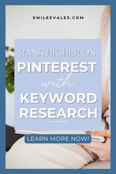 a woman holding a book with the title rank higher on pinterest with keyword research learn more now