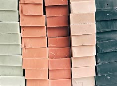 many different colored bricks stacked on top of each other