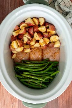 Crockpot Chicken Potatoes and Green Beans with seasoning on them. Chicken Green Beans Crockpot, Crockpot Chicken Potatoes, Chicken Potatoes And Green Beans, Chicken Green Beans Potatoes, Green Beans Chicken, Crockpot Chicken And Potatoes, Crockpot Green Beans, Slow Cooker Green Beans, Beans In Crockpot