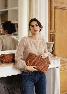 A woven leather zip pouch-meets-clutch to organize your odds and ends while traveling (no more digging through your suitcase for a charger!). Doubles as a clutch, so you can pack one less thing in your suitcase. Woven cow leather Open inner pocket and zipper closure Handwoven in India 12”x 6”x 4” Leather Zip Pouch, Leather Dopp Kit, Oversized Clutch, Odds And Ends, Dopp Kit, Zip Pouch, Clutch Wallet, Hair Dryer, Cow Leather