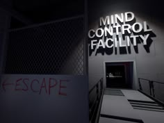 the escape sign is lit up in front of an entrance to a control facility at night