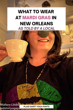 a woman drinking from a cup with the caption what to wear at mardi gras in new orleans as told by a local