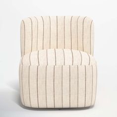 an upholstered chair with striped fabric on the back and arms, in front of a white background