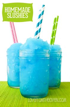 two frozen slushies in mason jars with straws