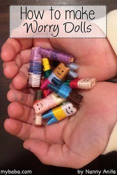 a person holding small colorful doll heads in their hands with text overlay that reads how to make worry dolls