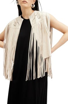 Polished studs and dramatic fringe add plenty of Western flair to this smooth leather vest. Open front Jewel neck Leather Professional leather clean Imported Fringe Leather Vest, Leather Fringe Vest, Fringe Vest, Leather Cleaning, Leather Vest, Leather Fringe, Jewel Neck, All Saints, Front Open