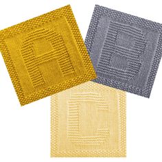 three different colored rugs with the letter e on them, one yellow and one blue