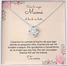 a necklace with the words mama written in spanish