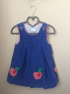 Adorable Vintage 1970s Apple Pinafore Dress for Baby. Buttons at Shoulders. Apples Appliqued on Skirt. Red and White Gingham Piping Along Top Front of Dress. Size: 2T 100% Cotton. Feels Like Corduroy. Hand Smocked Dress, Dress For Baby, Cotton Anniversary, Pinafore Dress, Smocked Dress, Kids Sweater, Baby Size, Vintage Yellow