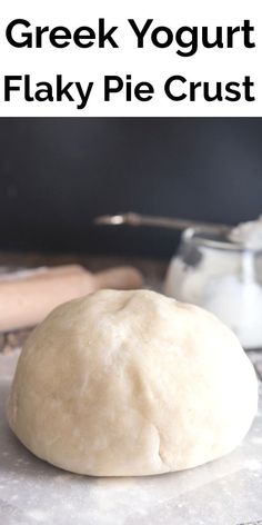 a ball of dough sitting on top of a table