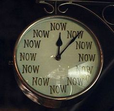 a clock with the words now and now written on it