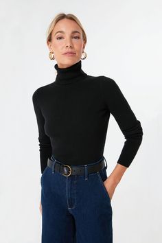 The Arlo Turtleneck Sweater is a classic layering piece that you’ll be wearing all season long, year after year. In a super comfy, stretch ribbed fabric, this fitted silhouette can be worn under a cardigan or tucked into your favorite denim. Style this versatile number under a blazer for a chic office outfit to give yo Classic Stretch Sweater With Ribbed Neckline, Ribbed Winter Workwear Top, Classic Ribbed Tops For Workwear, Fitted Sweater For Layering, Ribbed Tops For Winter Workwear, Ribbed Tops For Workwear In Winter, Ribbed Tops For Winter, Classic Everyday Ribbed Outerwear, Classic Ribbed Sweater