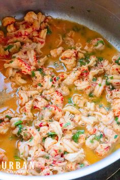 the food is being cooked in the pot on the stove and ready to be eaten