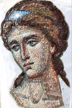 a mosaic portrait of a woman with a turban on it's head