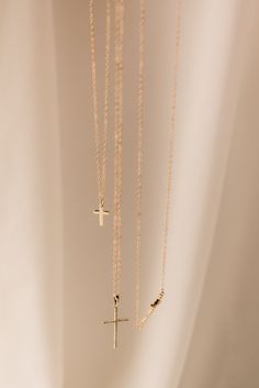 Our mini cross pendant is a dainty statement to add sparkle to any look. split 18k gold-filled mini cross pendant Your choice of chain length (16", 18", or 20") All materials are lead & nickel free Handmade with love by Luna & Jade in the U.S. Horizontal Cross Necklace, Edgy Rings, Everyday Wear Jewelry, Jewelry Christmas Tree, Handmade Gold Jewellery, Winter Jewelry, Mini Cross, Christmas Gift Jewelry, Holiday Jewelry