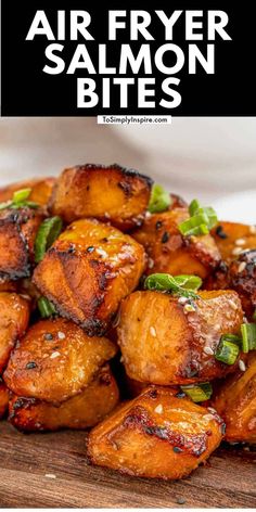 grilled air fryer salmon bites on a wooden cutting board with text overlay