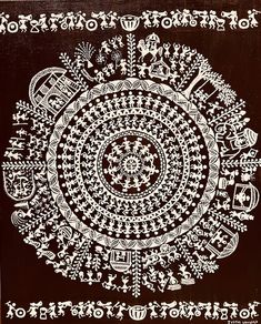 an intricately designed painting on black paper with white writing and symbols in the center