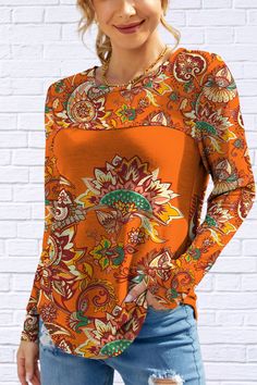 Add a pop of color to your wardrobe with our Printed Orche Round Neck Long Sleeve T-Shirt. This vibrant tee features a bold print that captures the essence of fall, making it a standout piece for the season. The round neckline and long sleeves provide a classic, comfortable fit, perfect for layering or wearing on its own. Whether you're dressing it up or keeping it casual, this t-shirt is sure to brighten your day and elevate your style. Make a statement this season—grab yours now and embrace th Smart Casual Wear, Kimono Sweater, Orange T Shirts, Dress Pant, Unique Outfits, Bold Prints, Brighten Your Day, Dress Accessories, Boutique Clothing