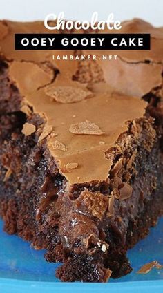 a piece of chocolate gooey cake on a blue plate with the title above it