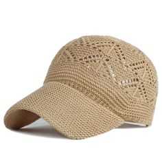 a beige hat with crochet detailing on the front and side, against a white background