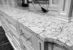 a marble counter top in a kitchen