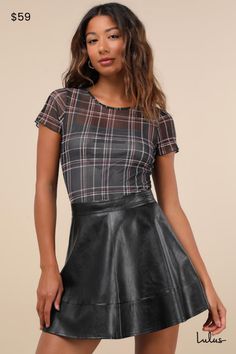 You'll be so excited to see how many ways you style the Lulus Modish Cutie Black Vegan Leather High-Rise Skater Mini Skirt this season! A timeless silhouette meets a modern faux leather fabrication that will make any ensemble instantly edgier. A banded, high-rise fit effortlessly flatters the waist, while the skater-style design features seam detailing and a flirty mini hem that completes the look. Exposed zipper/clasp at the back. Fit: This garment fits true to size. Length: Mid-thigh. Waist: F