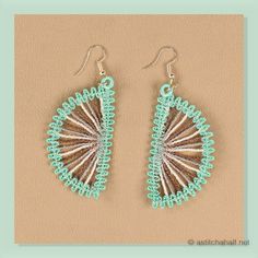 two pairs of earrings with green and brown beading on the front, one is shaped like a fan