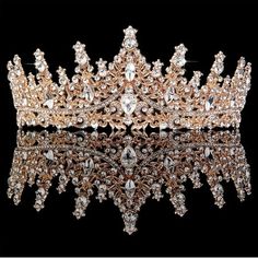 Product Description Three highlights of our crystal Tiaras The alloy with a diamond-like appearance and hard texture is paired with high-quality rhinestones, which will sparkle and sparkle for a long time. At each end of the crown, there is a round hole on either side, allowing you to secure your hair into the holes, preventing it from easily coming loose and keeping your beauty in place at all times. A full crown design, specifically crafted to suit the female head shape, perfectly conforms to your charming hairstyle and facial contours. Gold Crystal Crown for women Hope you can be more charming! We have always been committed to helping you find a more confident, independent and beautiful self. It's your special day and we want you to look AMAZING! So, what are you still thinking about, C Sweet 16 Crowns, Coming Of Age Ceremony, Quince Crowns, Quince Crown, Princess Tiaras, Queen Crowns, Crystal Princess, Quinceanera Crown, Fantasy Queen