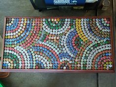 there is a large amount of bottle caps on the floor