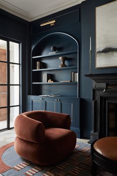 a living room filled with furniture and a fire place