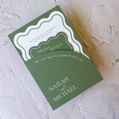 two green and white wedding cards sitting on top of each other with the words, we can't wait to celebrate within