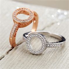 The Circle is an unbroken line which has no beginning, no end and no direction. This delicate ring features a line of brilliant white CZ stones creating a modest shimmer. At only 1.2mm wide this ring is truly dainty and graceful.Stones: CZ Metal: 18k Rose or White Gold plating over alloy. Comes in a gift box. (Reg $37.00) Rose Gold Infinity Ring, Olive Branch Ring, Gold Infinity Ring, Circle Symbol, Casual Rings, Silver Rings With Stones, Finger Rings, Rings Wedding, Delicate Rings