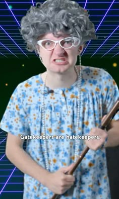 an old woman with glasses holding a stick in front of her face and text that reads,