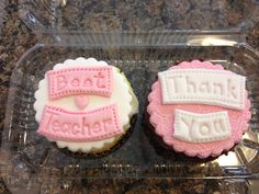 two decorated cupcakes with thank you written on them