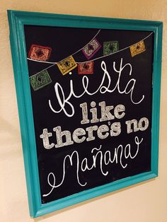 a chalkboard sign that says fiesta like there's no manana