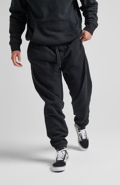 Take on off-duty days in these baggy sweatpants crafted with a brushed fleece interior and handy pockets for your essentials. 30" inseam Elastic/drawstring waist Side-seam pockets; back patch pocket 60% cotton, 40% polyester Machine wash, tumble dry Imported Men’s Outfits With Sweatpants, Sweat Pants For Boys, Men’s Sweatpants Fashion, Sporty Loose Fit Sweatpants With Drawstring, Sporty Baggy Sweatpants With Drawstring, Sporty Baggy Drawstring Sweatpants, Baggy Drawstring Sporty Sweatpants, Comfy Cotton Joggers With Drawstring, Comfy Relaxed Fit Joggers With Pockets