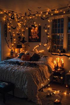 a bedroom decorated with halloween decorations and lights