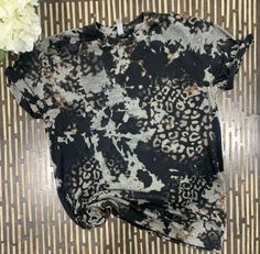 Check out our trendy acid wash leopard cheetah t-shirt, now available in Adult Unisex Long Sleeves! Our Simply Sun Bleached Next Level Acid black wash distressed t-shirts are super soft and comfortable for everyday wear. High quality Next Level t-shirts are made to order and each t-shirt is unique.  Colors will range from browns to tans to greys.  Please note acid wash shirts will vary, we cannot duplicate a photo. Each Shirt will have a unique acid wash design and colors. From browns to tans to Leopard Bleach Shirt, Black Tiger Print Crew Neck Top, Black Crew Neck Top With Tiger Print, Black Bleached Cotton Tops, Hand Dyed Black Crew Neck T-shirt, Summer Bleached Black T-shirt, Black Bleached T-shirt For Summer, Summer Black Bleached T-shirt, Black Bleached Relaxed Fit Tops