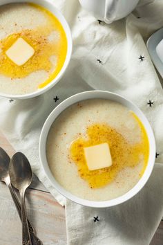 two bowls of soup with butter on top