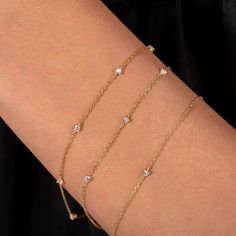 Enhance your elegance with our Bezel Station Bracelet, featuring sparkling stones set in sleek bezel settings along a delicate chain. This sophisticated design adds a touch of timeless beauty to any outfit, making it perfect for any occasion. Elevate your style with this versatile and refined accessory. Made with 100% recycled Sterling Silver base with a thick layer of high quality 14k gold plating ensuring lasting quality.  This product is waterproof, tarnish-free, sweatproof, hypoallergenic an Glamorous Jewelry, Station Bracelet, Cz Bracelet, Zodiac Jewelry, Delicate Chain, Pearl Jewellery Earrings, Chic Jewelry, Bracelet Clasps, Cuff Earrings