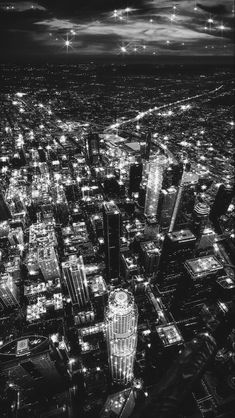 an aerial view of the city at night